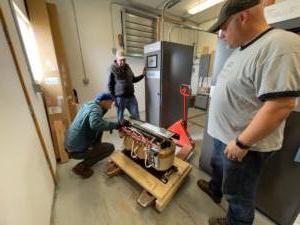 Moving the 900 pound transformer into place