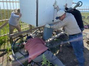 Stabilizing the tuning cabinet at the base of the East Tower