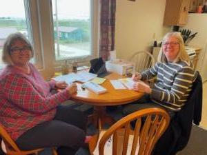 Marina & Jill address envelopes for 100% Sunday